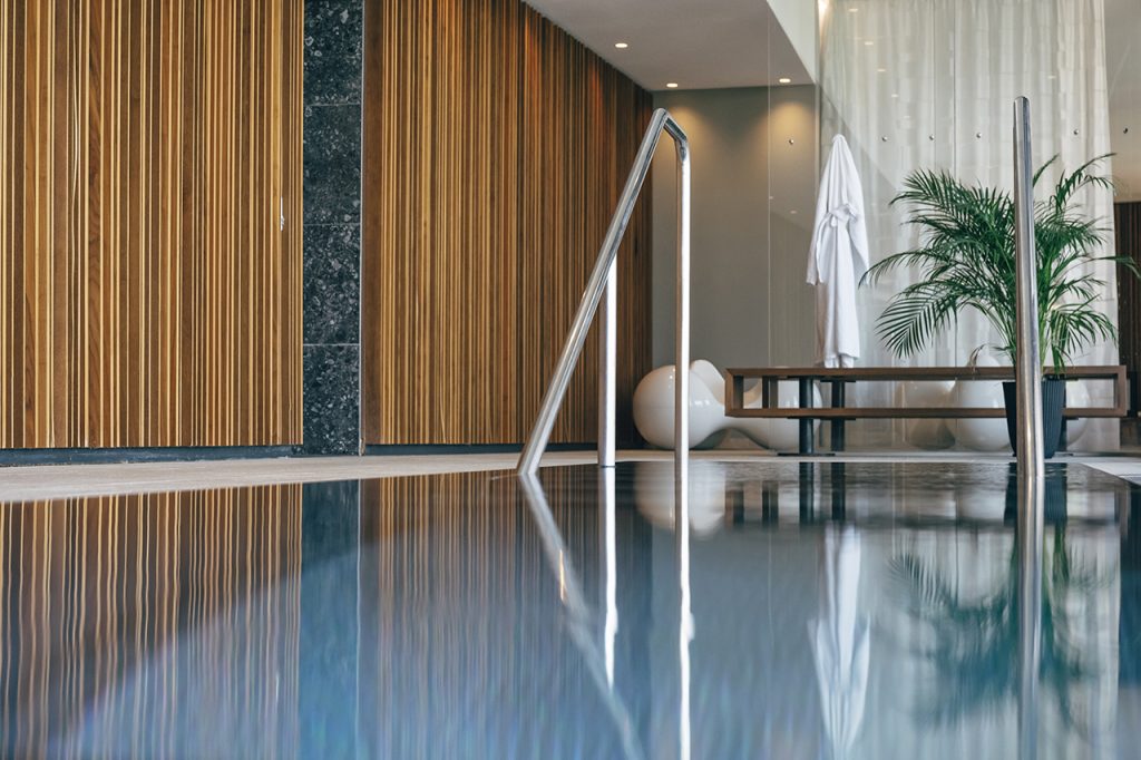 Luxury travel Indoor Swimming Pool designed by Archisphere architects and interior designers at Balance Resort Stegersbach photo copyright by christof wagner