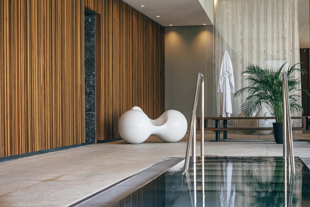 Spa area with swimming pool entry interior design by archisphere a vienna and zurrich based architecture studio photo copyright by christof wagner