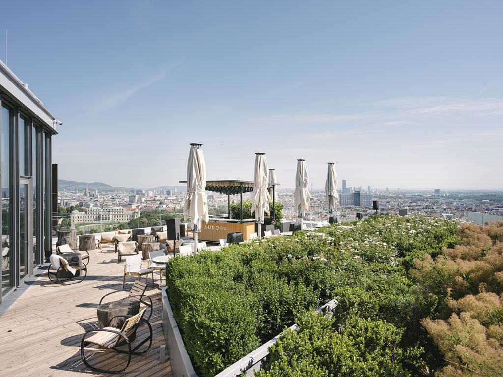 Terrace design of aurora night rooftop bar hotel andaz by archisphere an interior architecture studio in vienna photo copyright by christof wagner